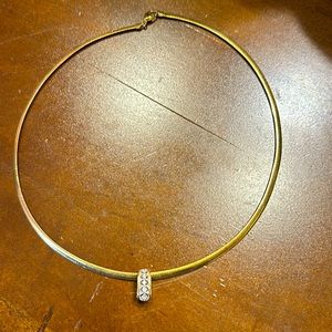 Women’s gold colored necklace with cz pendant